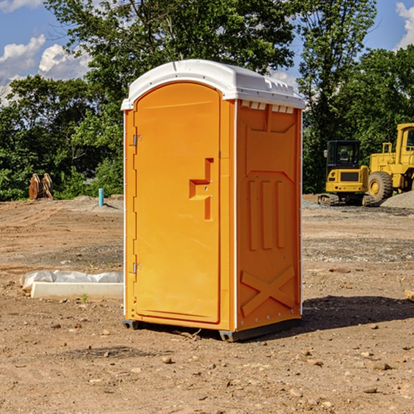 how often are the portable restrooms cleaned and serviced during a rental period in Canadian Lakes Michigan